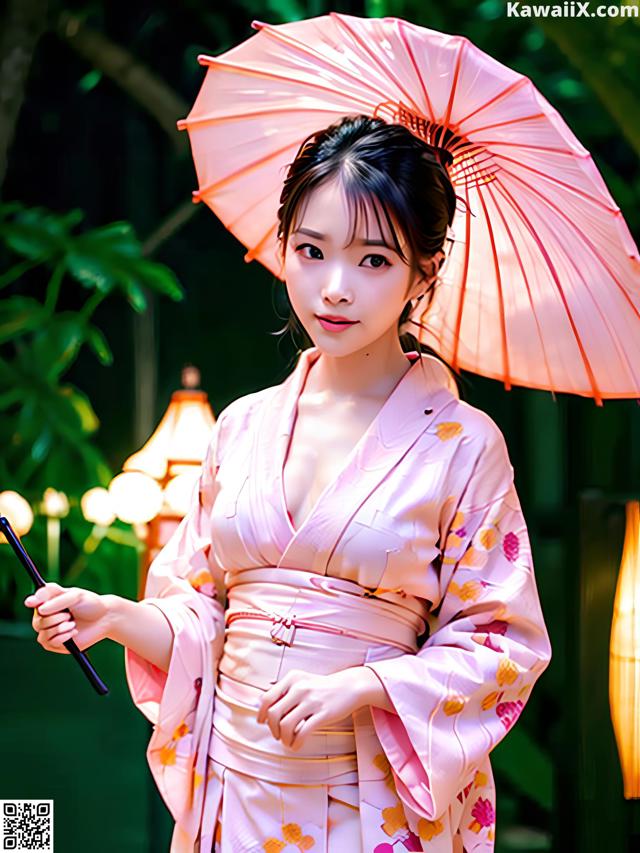 A woman in a pink kimono holding an umbrella.