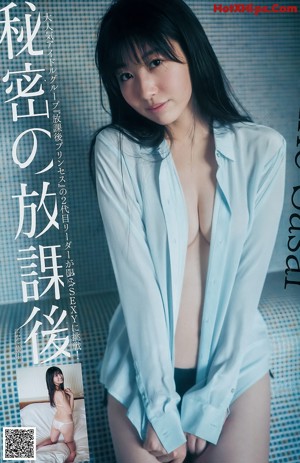 A naked asian woman with long black hair is posing for the camera.