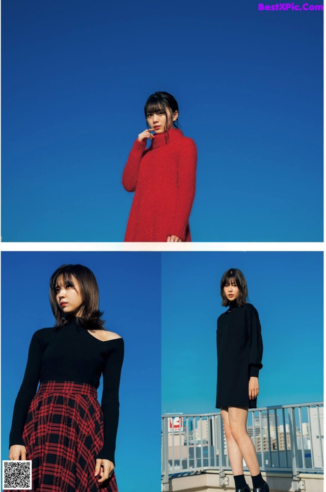 A woman in a red sweater and black dress standing on a balcony.