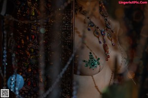A woman in a belly dance costume posing for a picture.